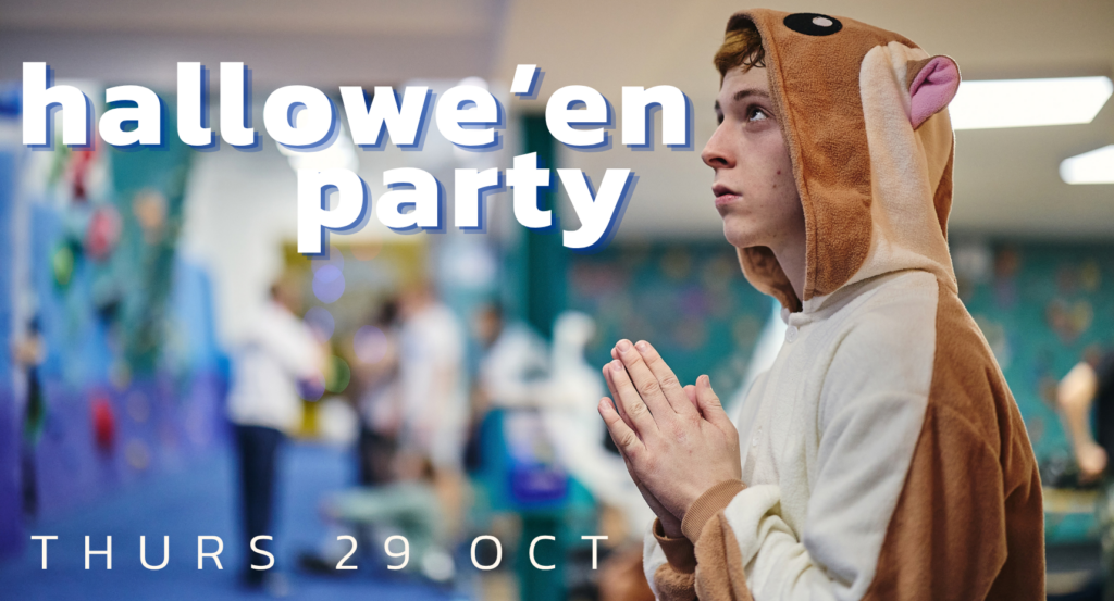 A person dressed as a flying squirrel in a bouldering gym. Text: Hallowe'en party ; Thurs 29 Oct